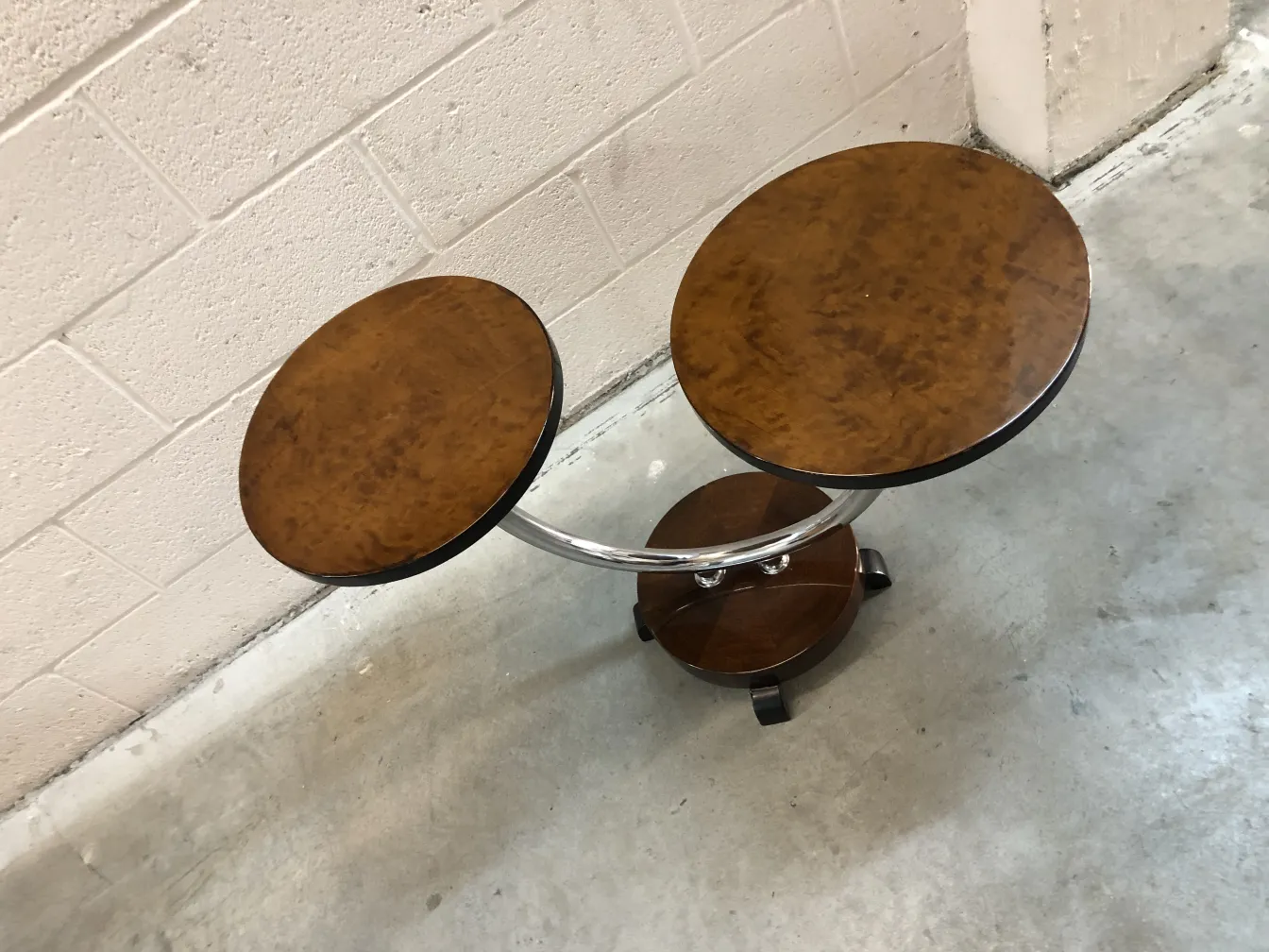 antique small table with two round tops and circular base