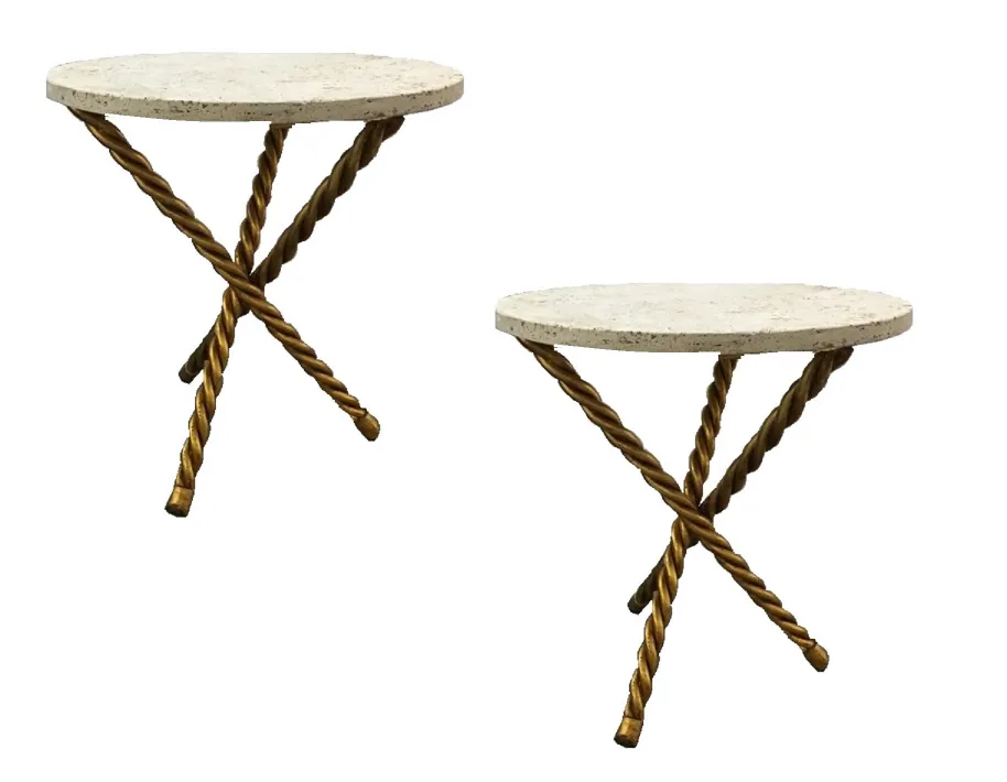 Two antique small tables with gold bases and round tops, perfect for cozy interiors.