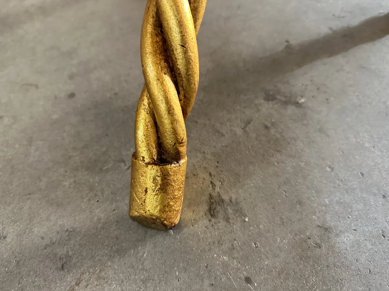 two antique small tables with a decorative design