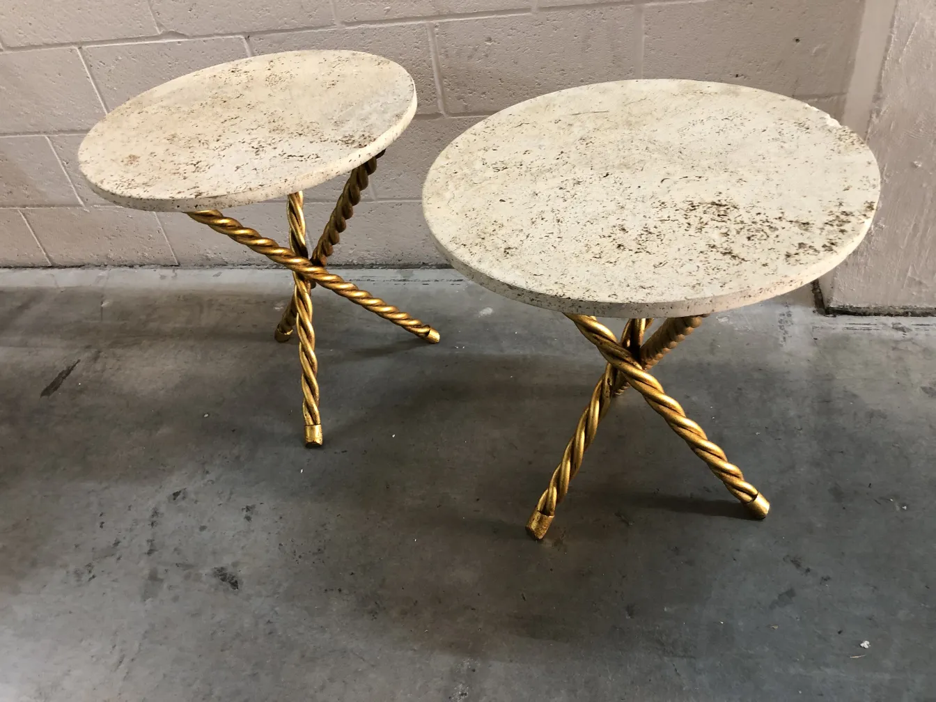 Set of two antique small tables with round tops and twisted golden legs