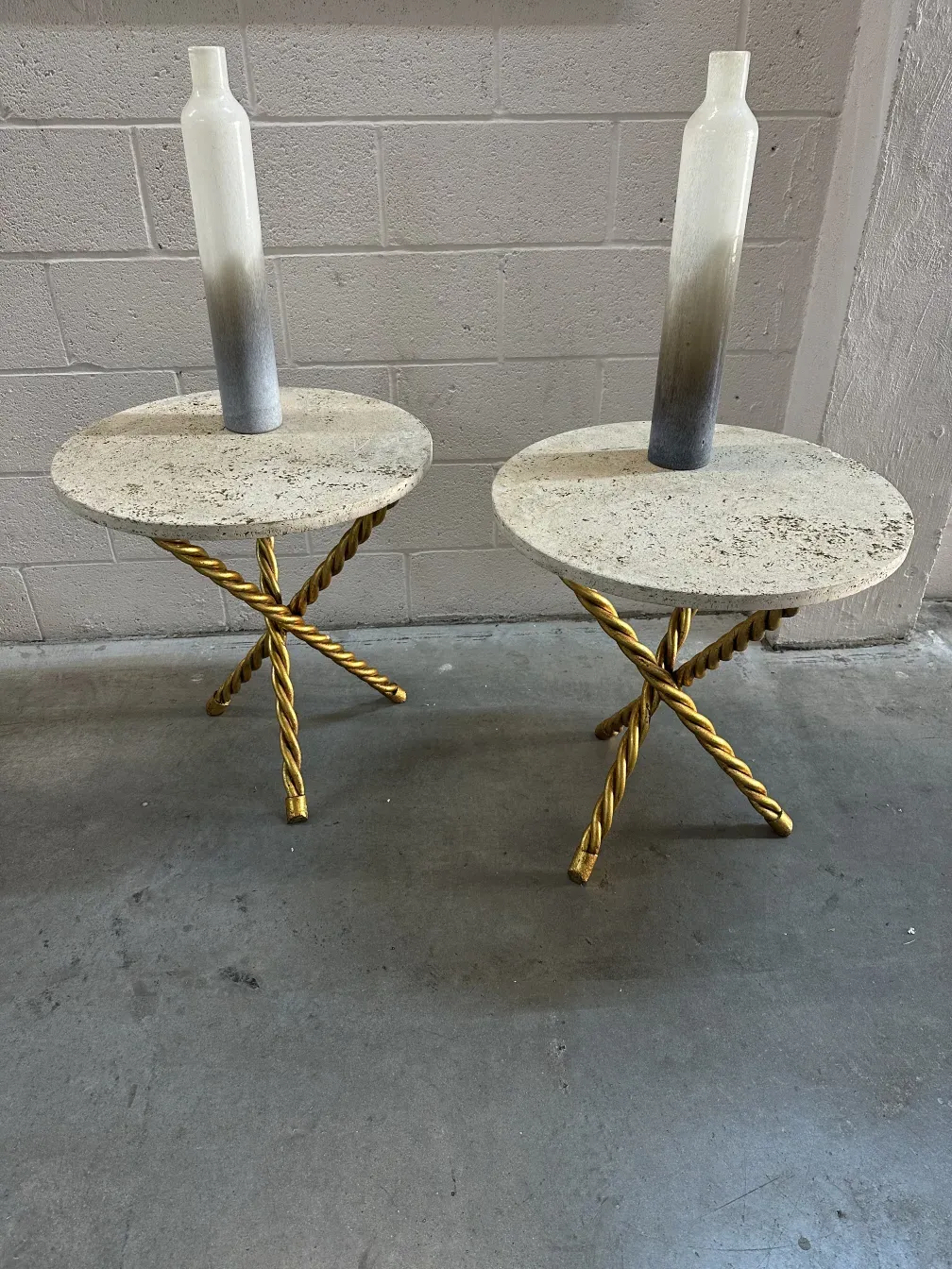2 antique small tables with golden bases and round tops
