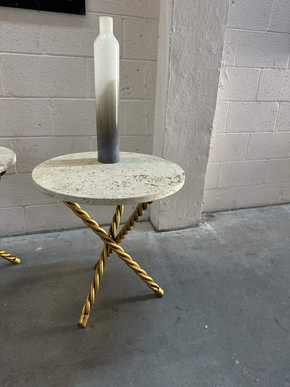 Two antique small tables with decorative golden bases