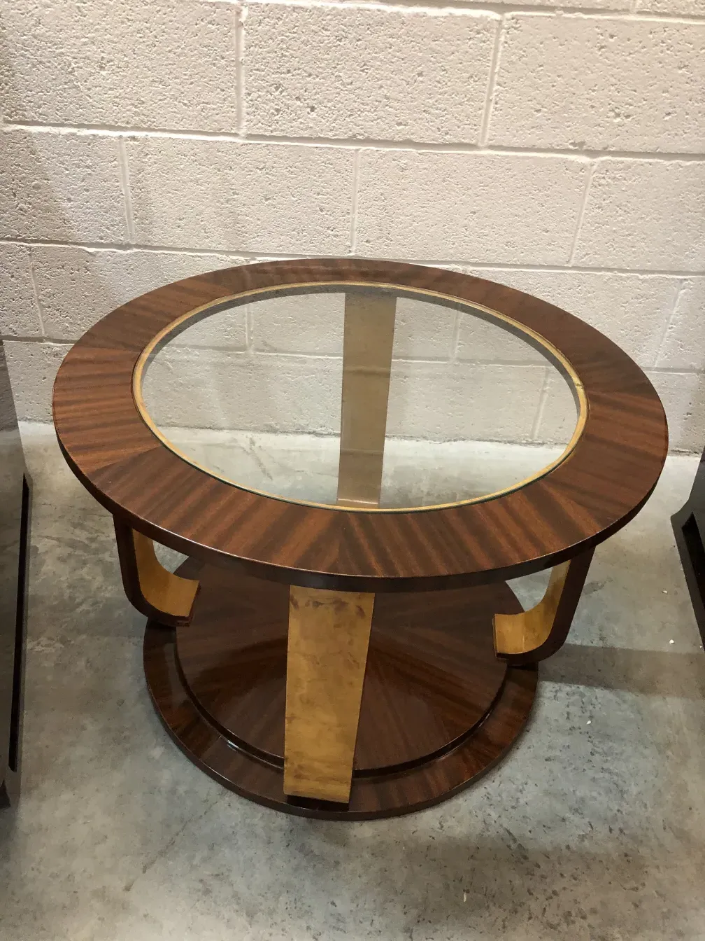 two antique small tables with round design and gold detail