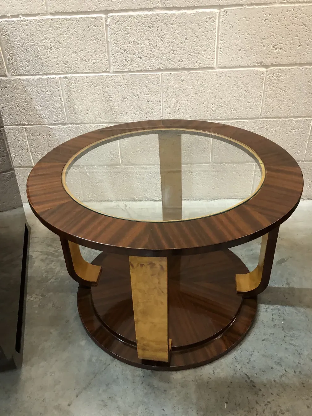 2 ancient small tables with elegant design in a modern setting