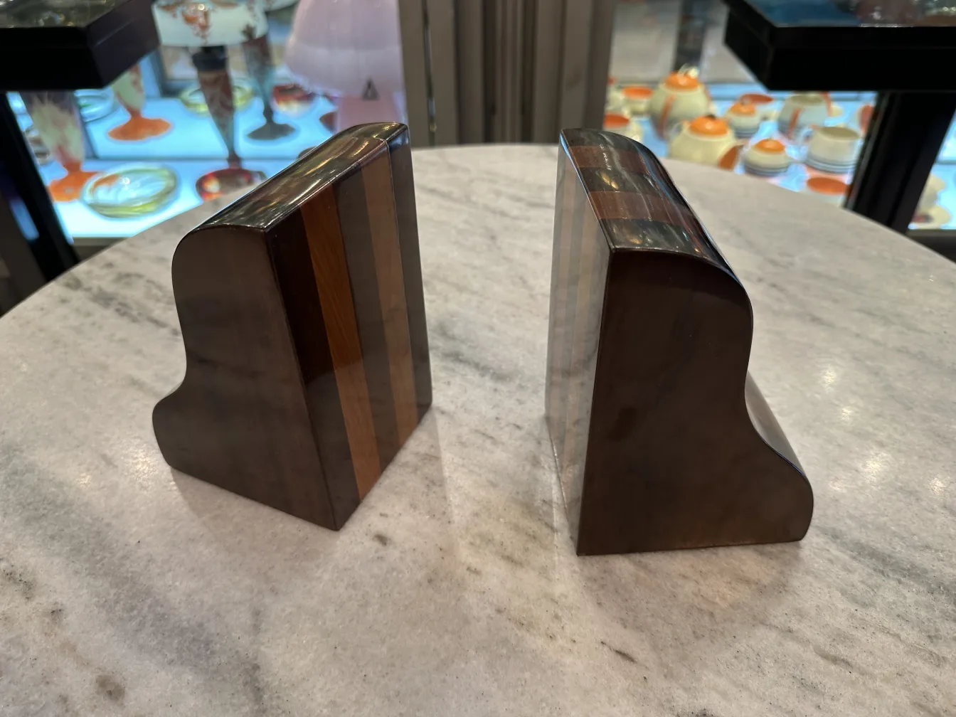 Pair of antique bookends with elegant design, in a vintage setting.