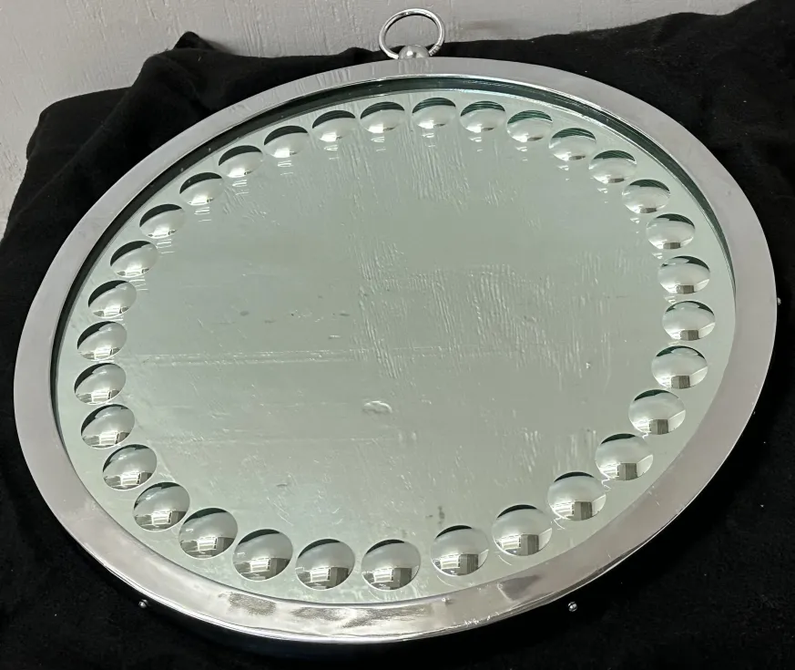 two antique mirrors with round decorative frame