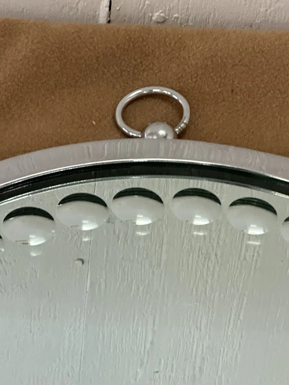 Side view of two antique mirrors with details