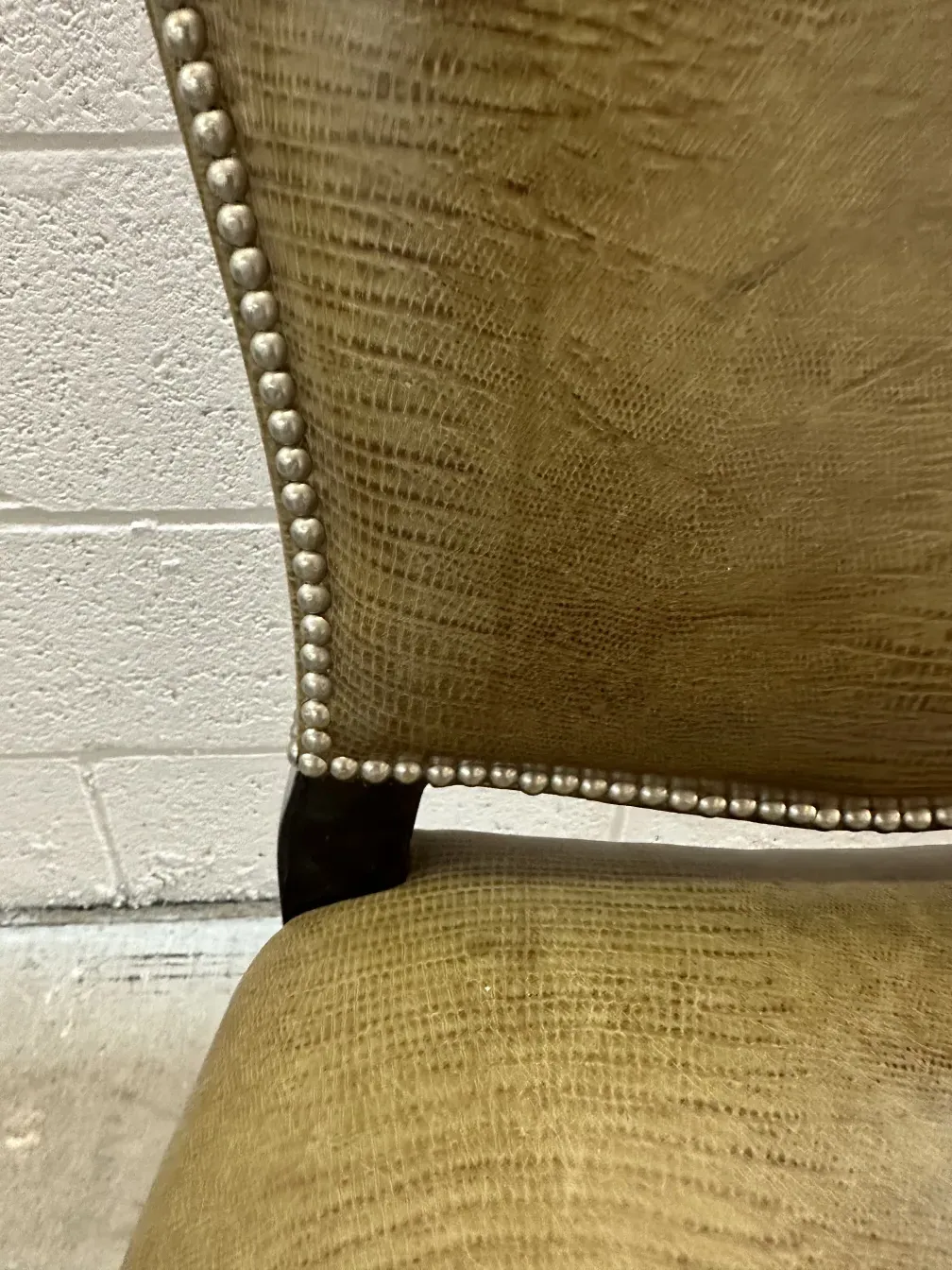 detailed view of antique chairs with adornments