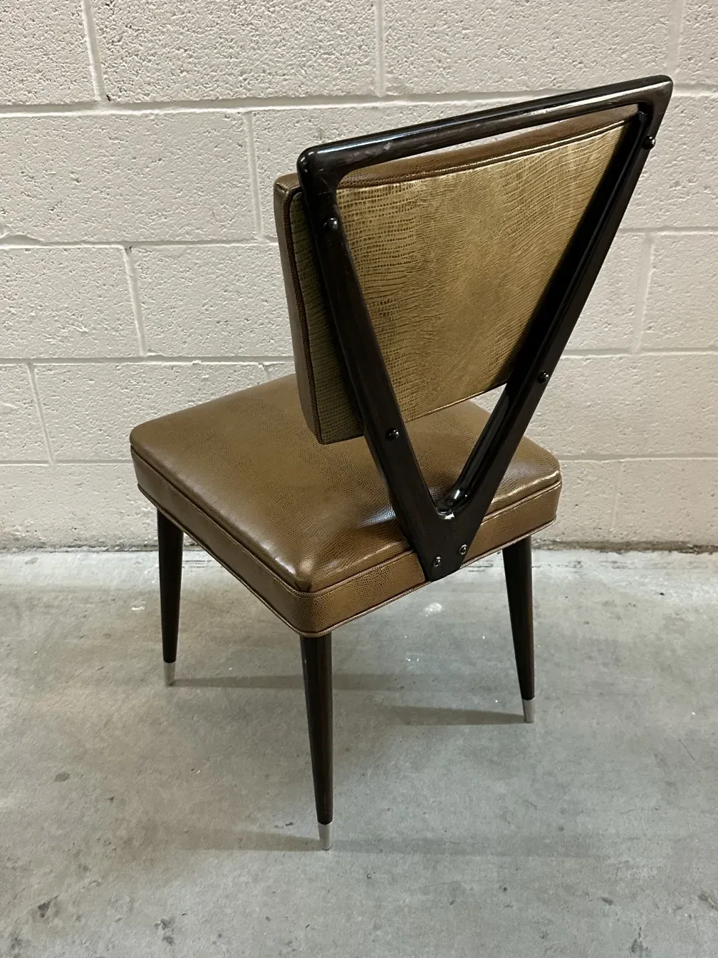 12 chairs carlo mollino antiques with triangular back in modern setting