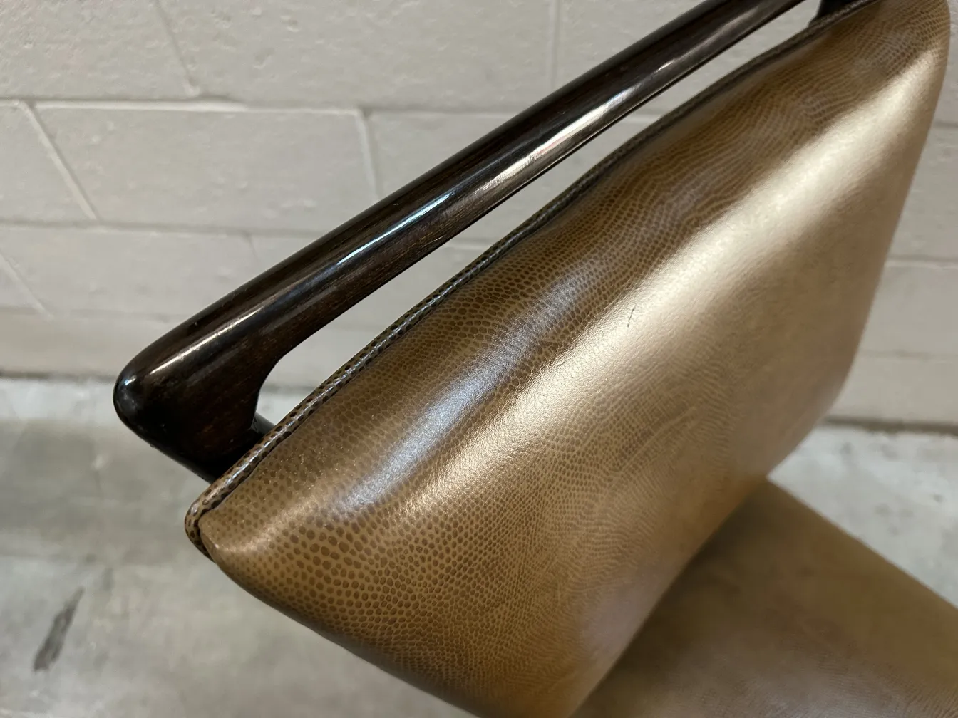 Detail of 12 antique chairs with arms and upholstery