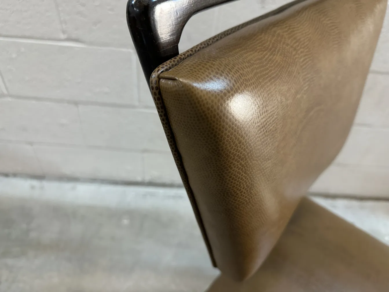 Close up of 12 antique chairs carlo mollino showcasing unique design.