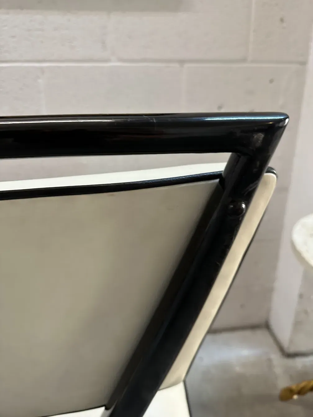 detail of two antique chairs carlo mollino with elegant structure in a modern setting