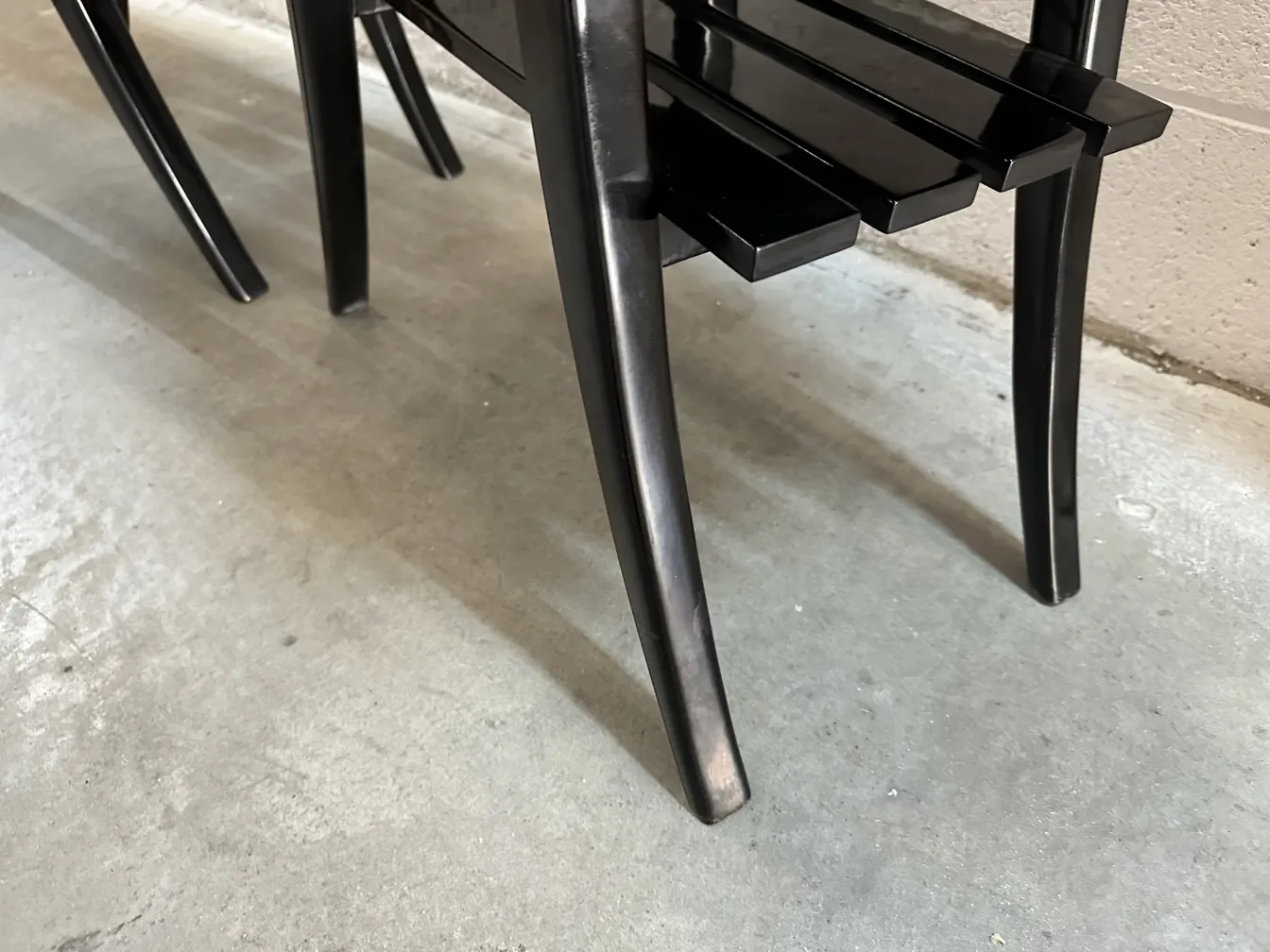 antique bedside table with elegant legs in a modern setting