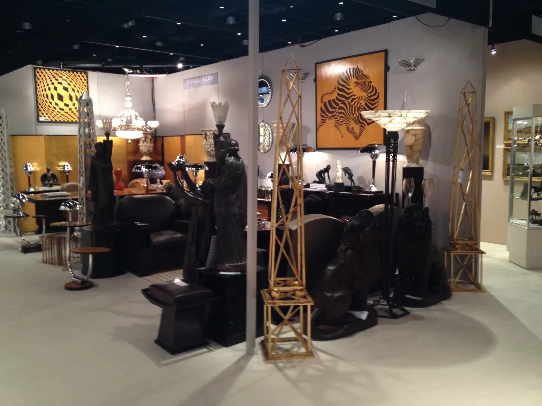 two antique decorative obelisks in a gallery