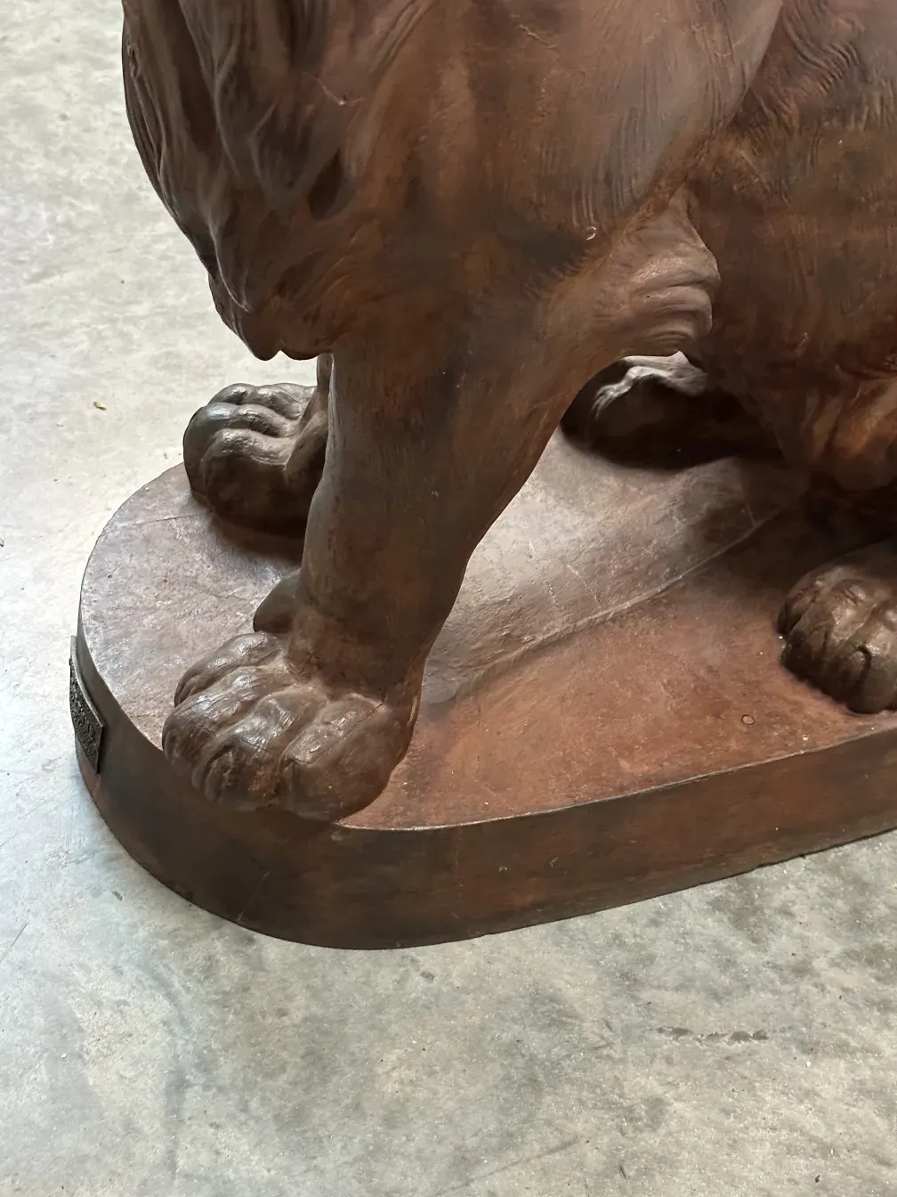 antique depiction of two lions, base details, a. durennee