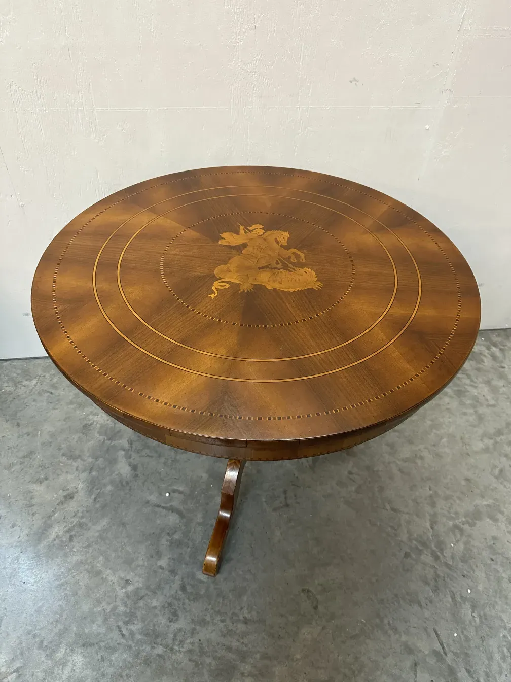 antique round table with intricate decorations