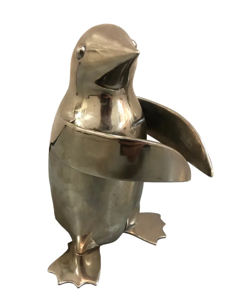 Antique figure of 2 decorative metal penguins with shiny details