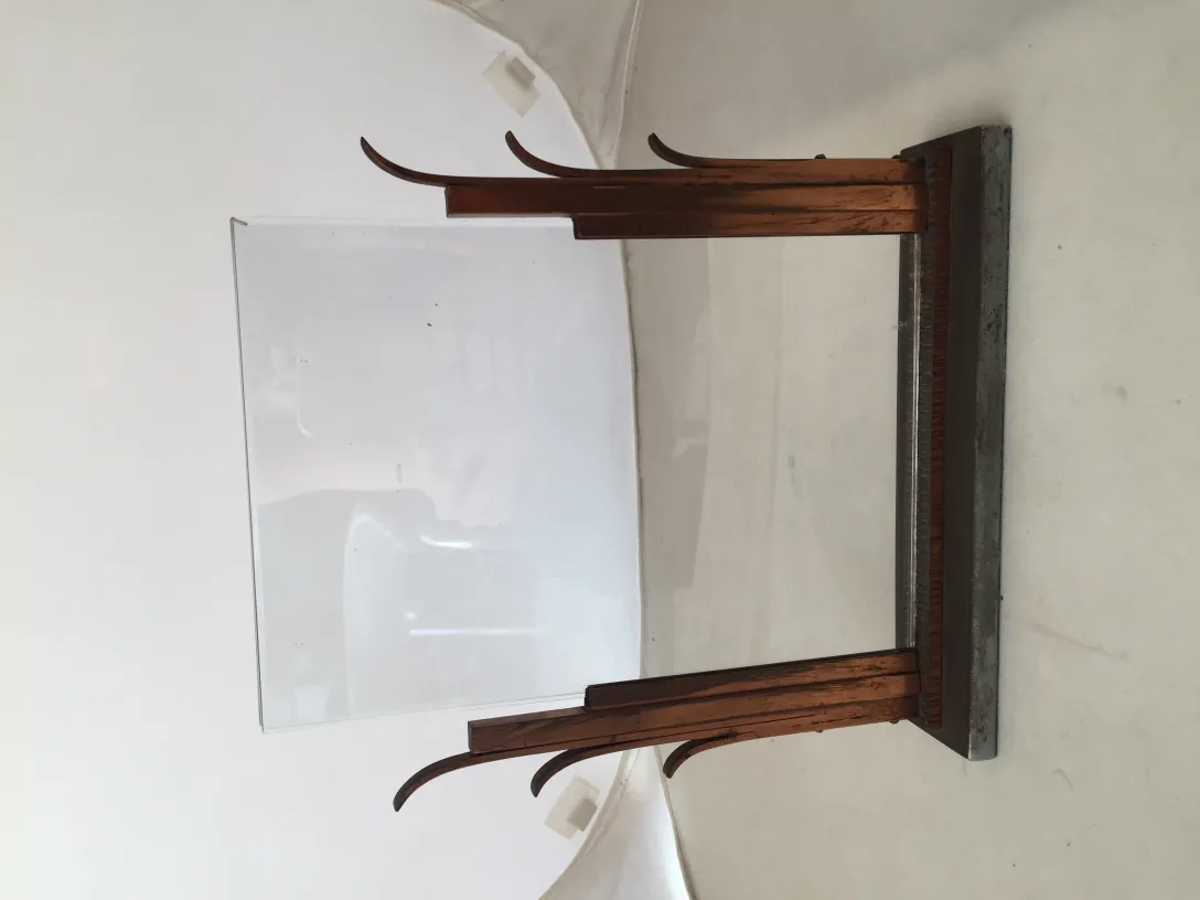 Antique picture frame with an elegant design in warm colors, light background