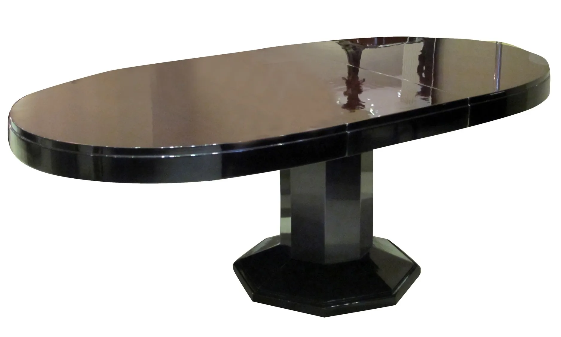 Antique dining table with an octagonal base.