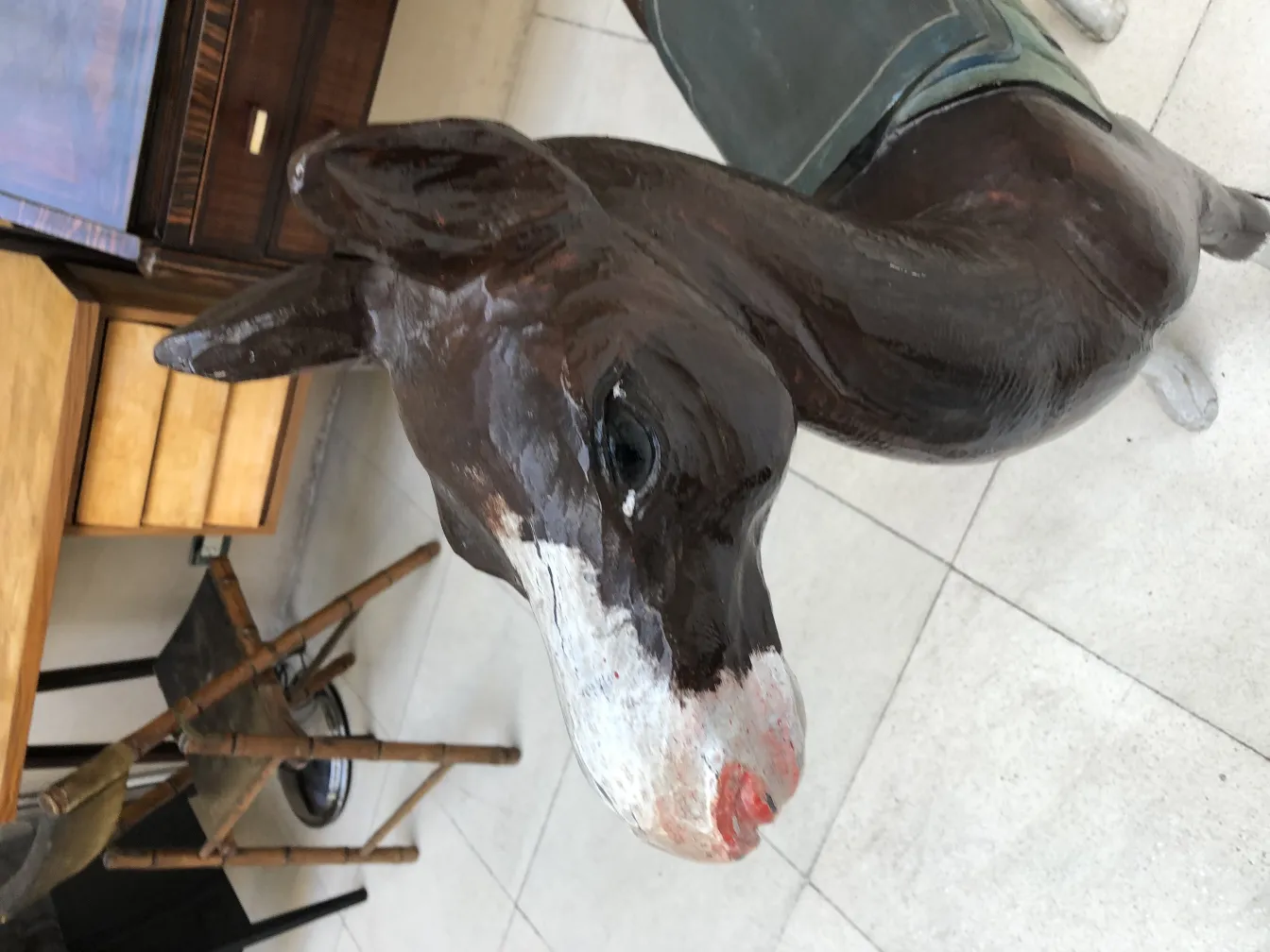 antique decorative llama sculpture with facial details