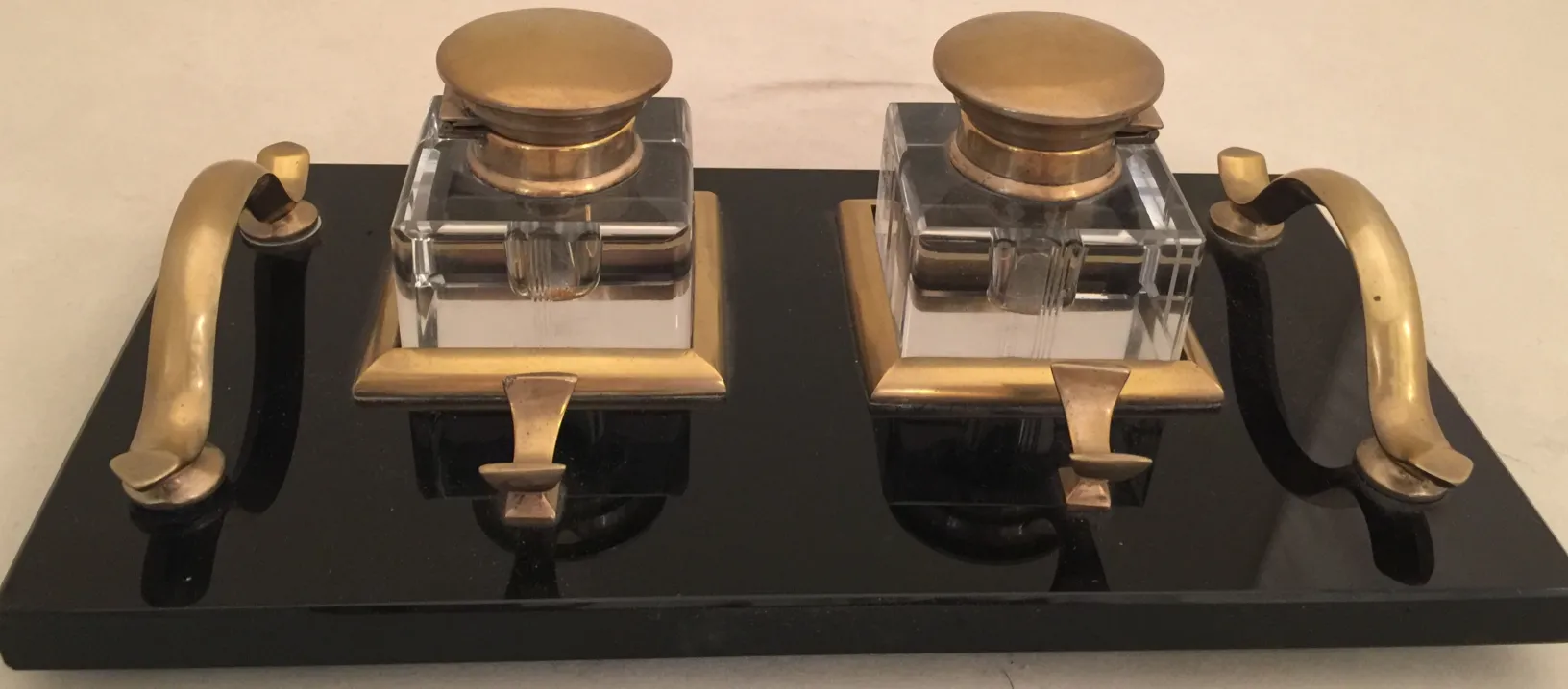 antique inkwell in glass with gold lid and black stand