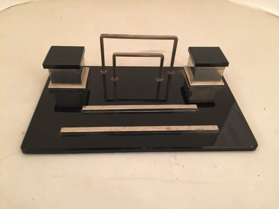 Antique inkwell with metal structure and two compartments