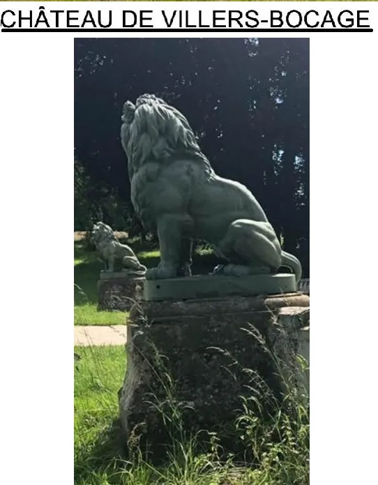 Estatua antigua de 2 leones de A. Durenne en un entorno verde.