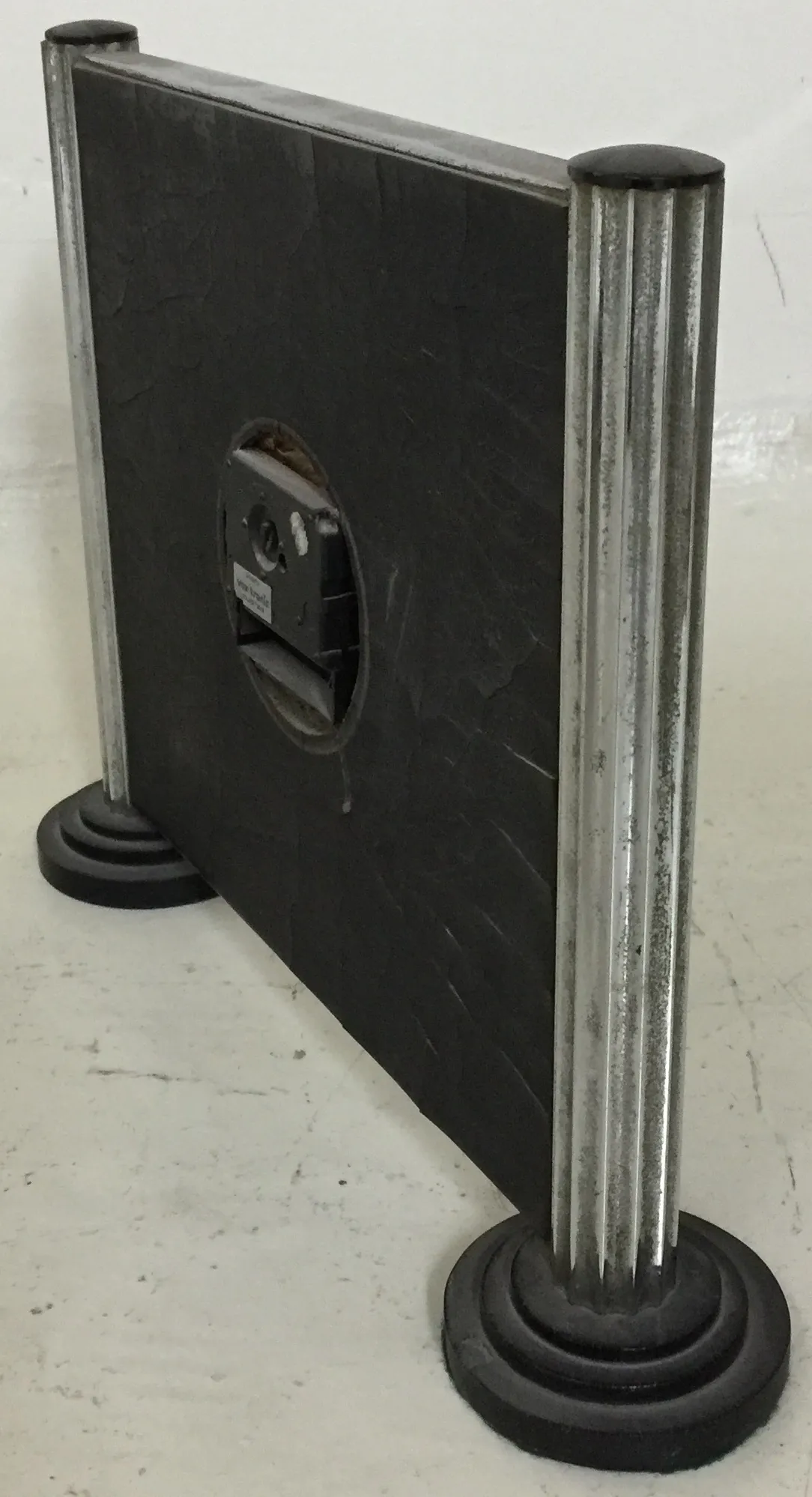 antique table clock with simple design and legs