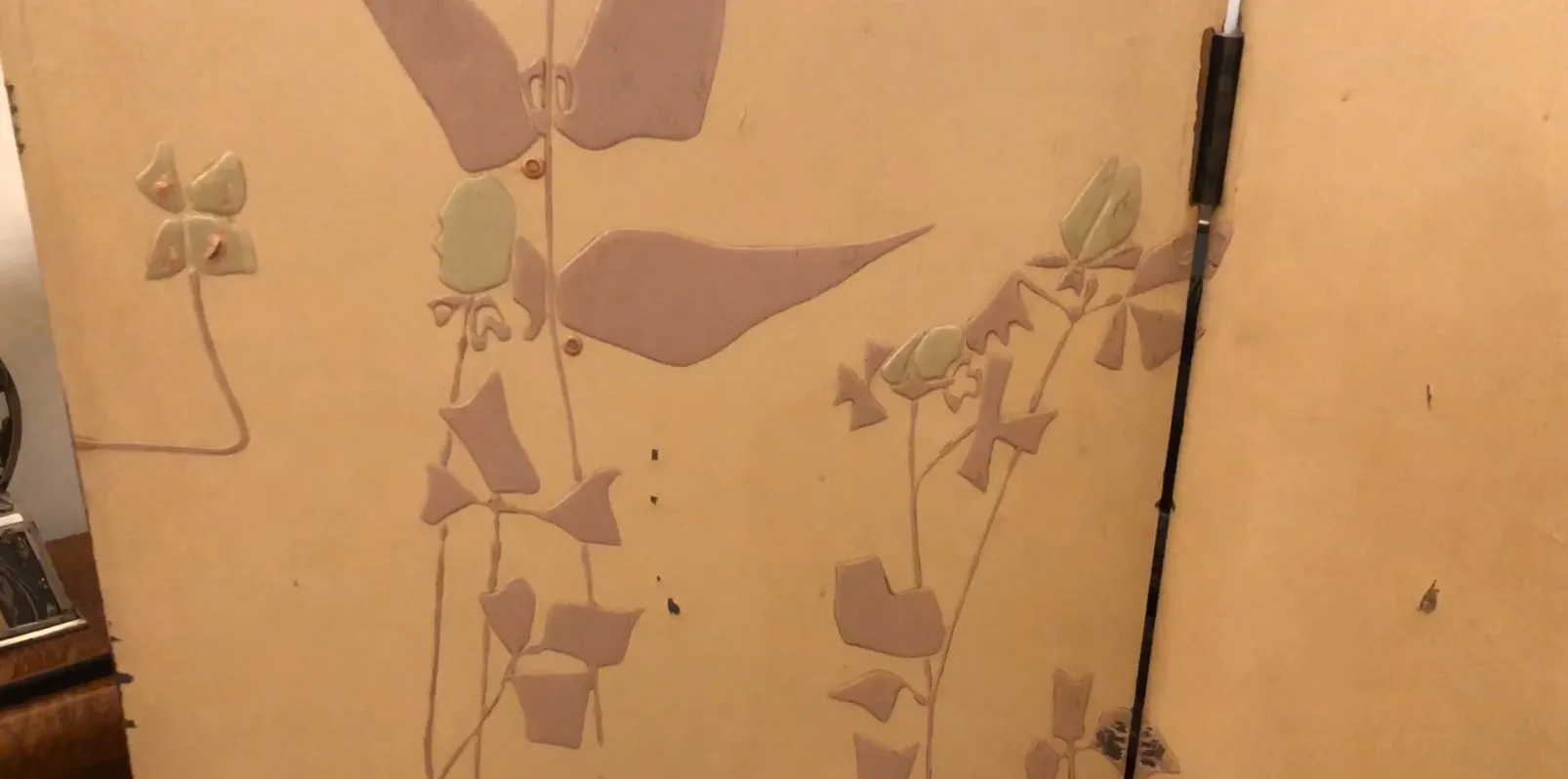 antique folding screen decorated with soft flowers and organic shapes