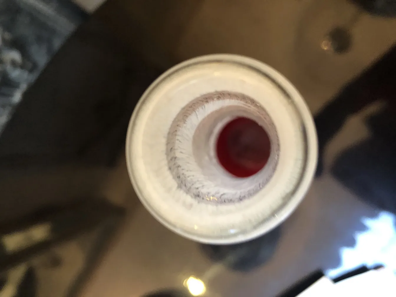 top view of an antique vase with red interior