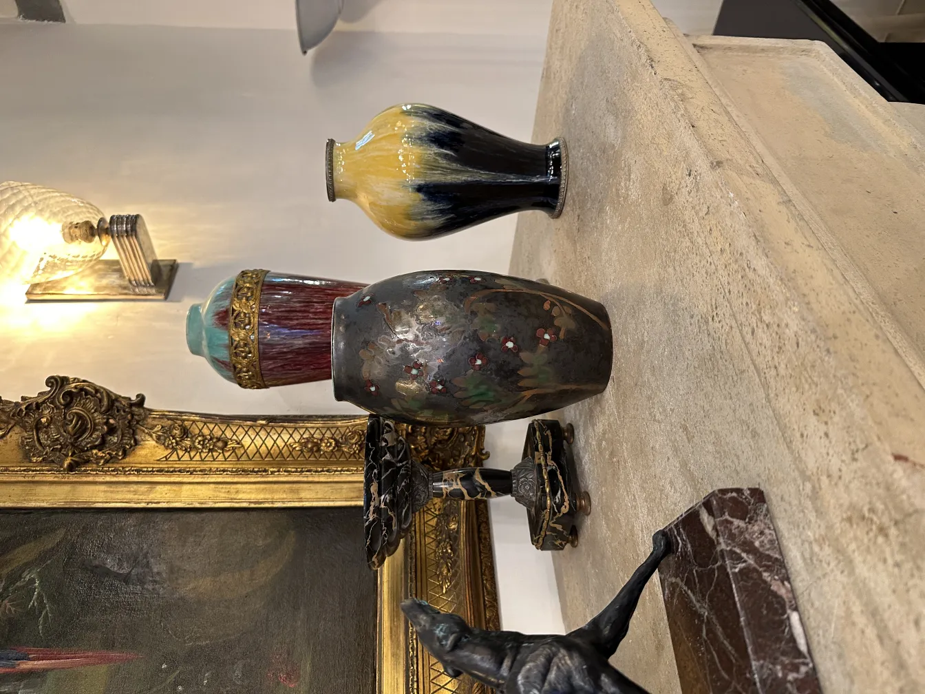 Antique bookends with decorative design and colorful patterns.