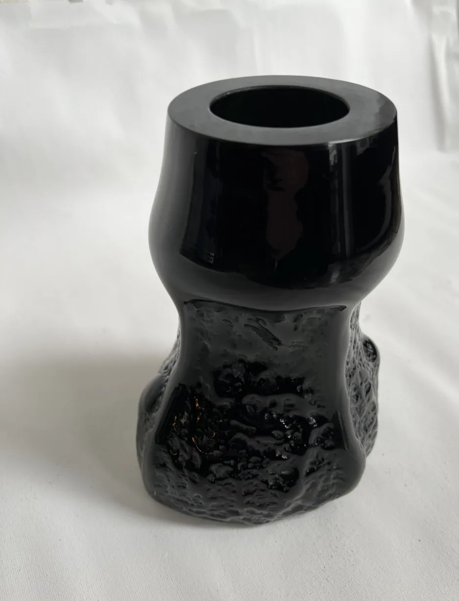 antique vase with organic shape in black color