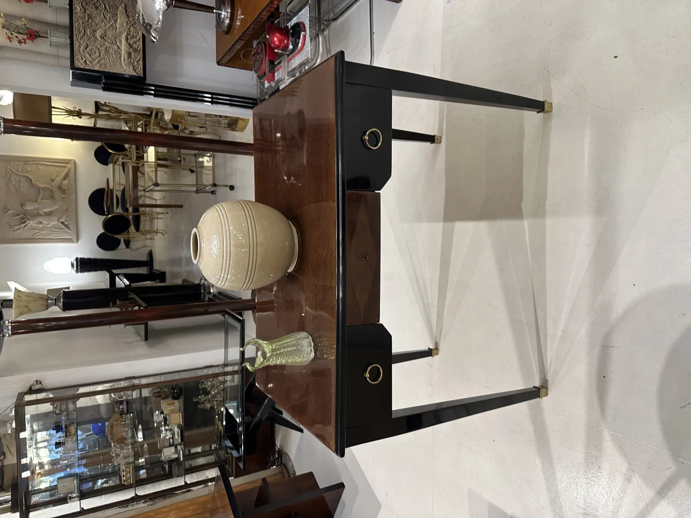 decorative antique vase on table with other items