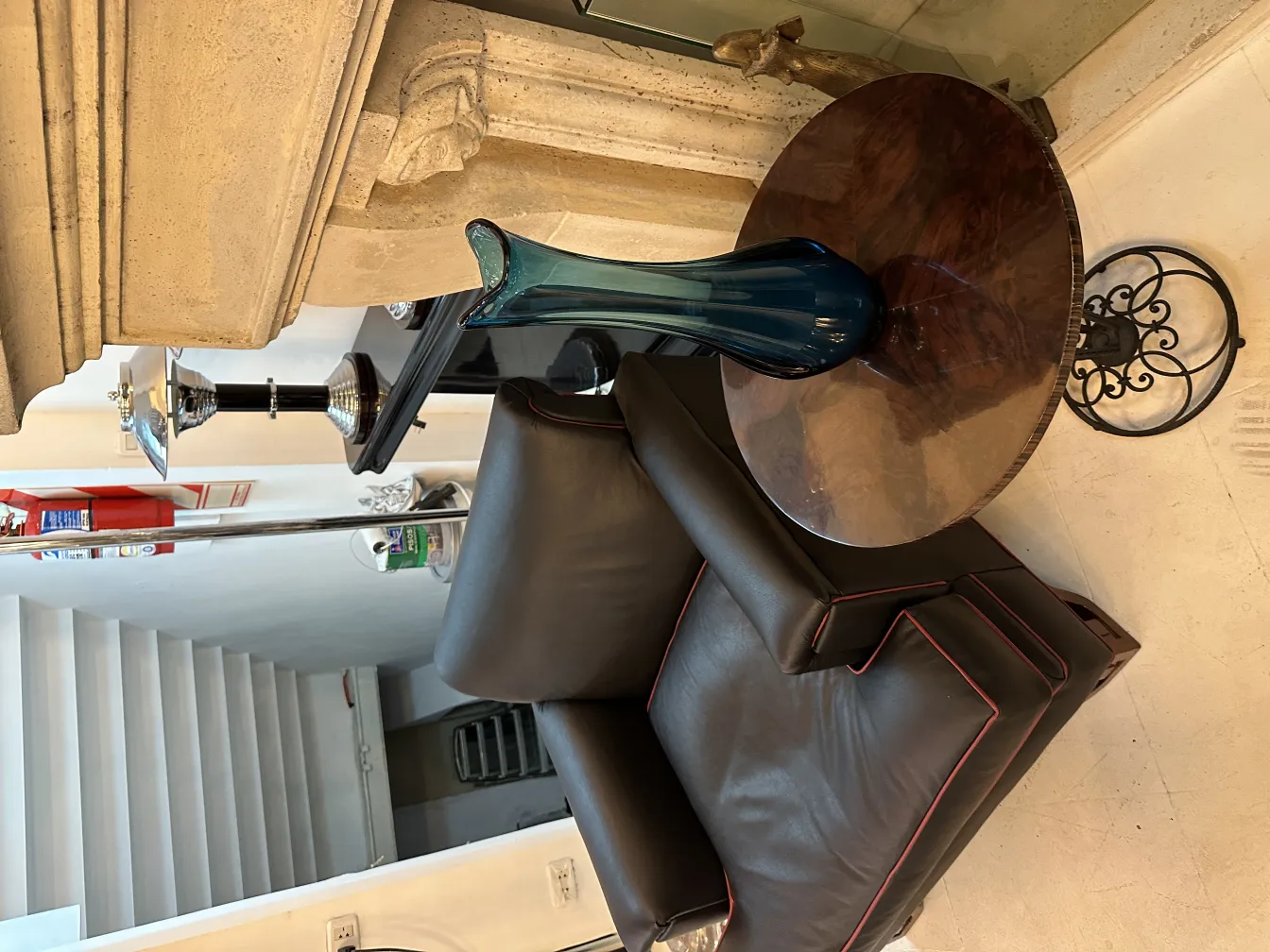 antique blue glass vase on a round table