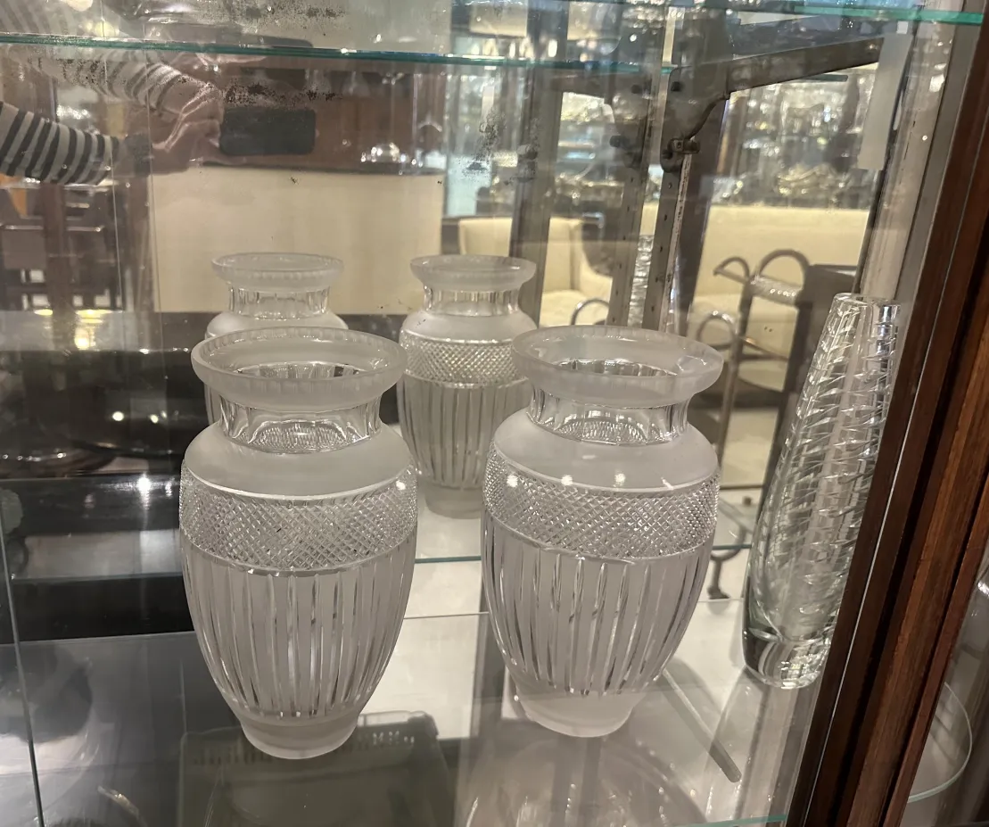 two antique vases with decorative design on display
