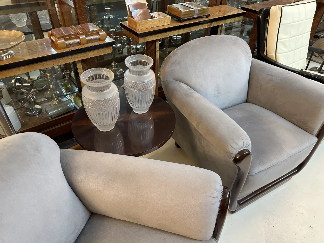 two antique decorative vases on a round table