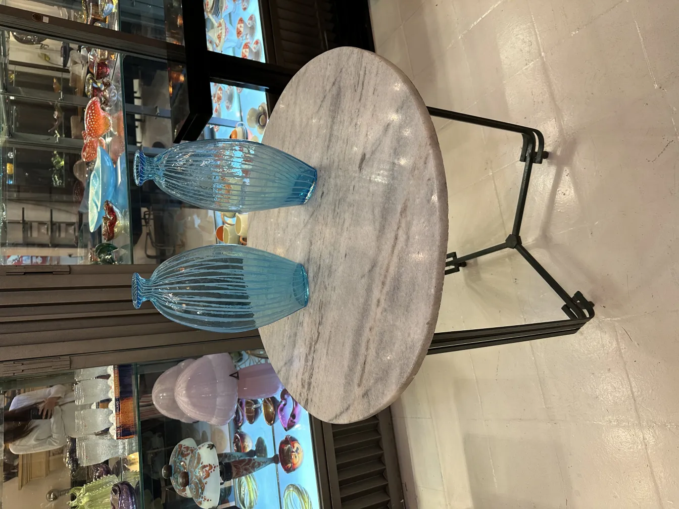 two antique blue vases on a table