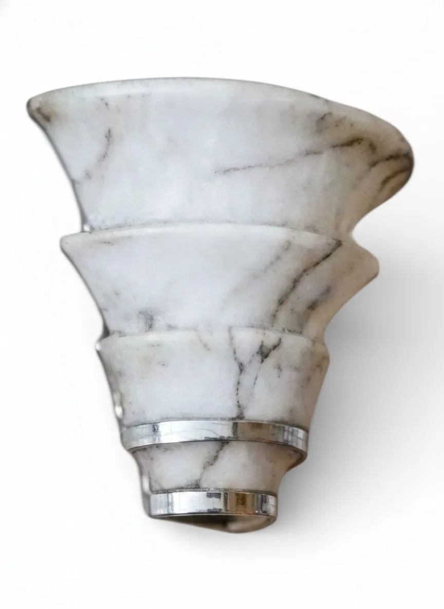 pair of antique sconces with elegant design, enhancing the ambiance