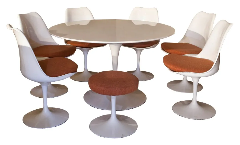 Antique dining table with unique and modernist chairs for 7 people