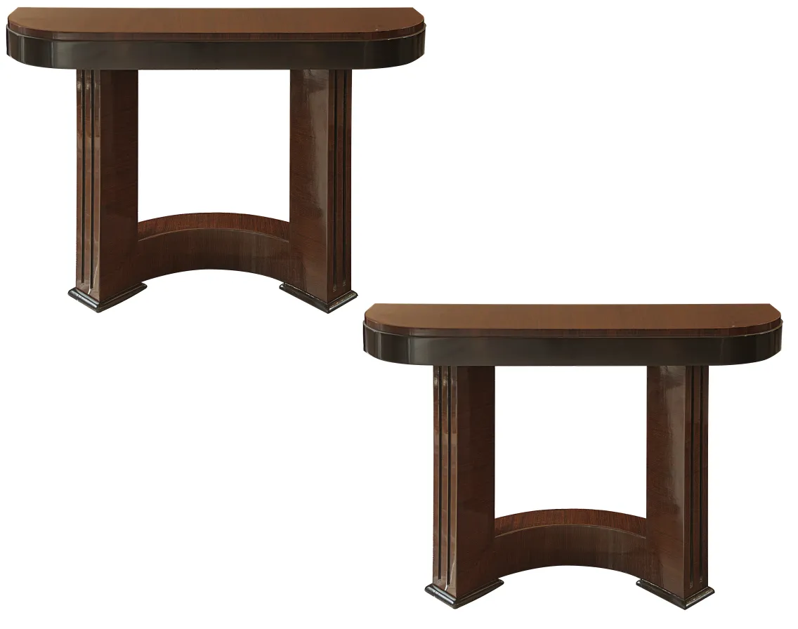 Two antique consoles with elegant design in the setting