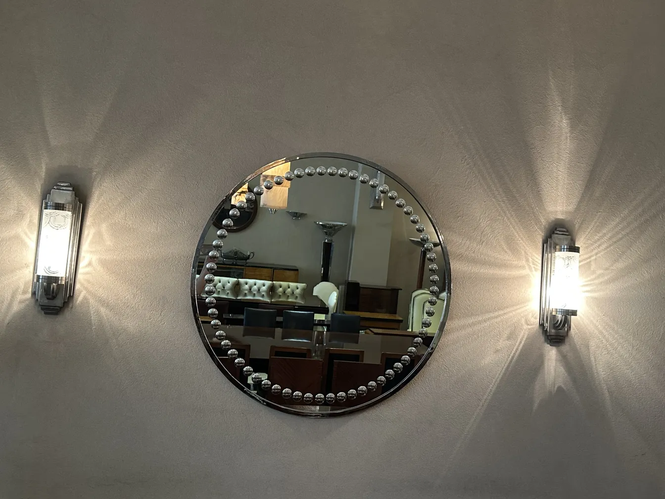 antique decorative mirror with bright details in an elegant setting