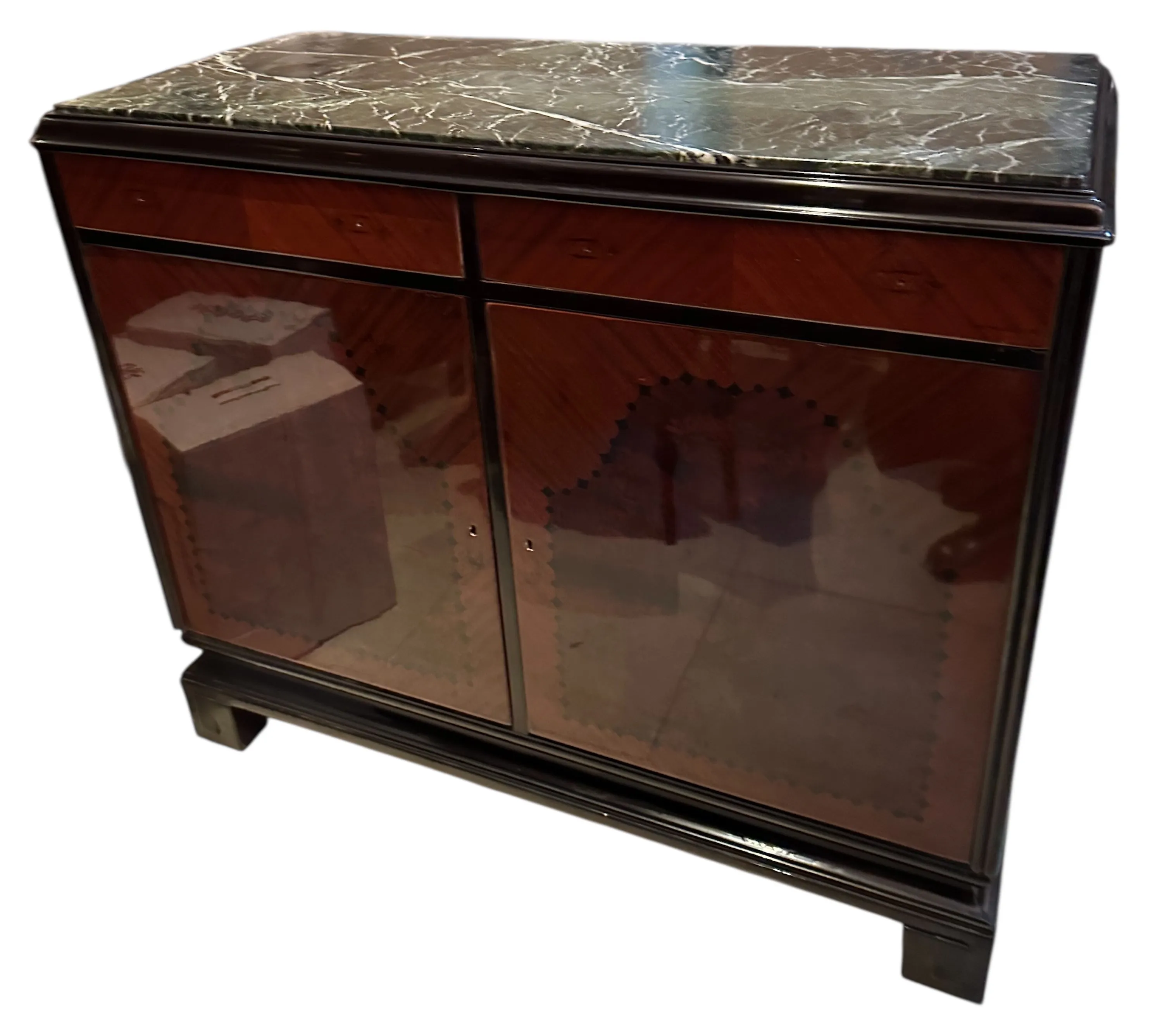 antique sideboard featuring an elegant design and unique details in a cozy environment with a light background.