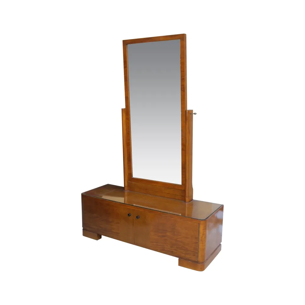 miroir ancien debout sur un meuble avec deux portes