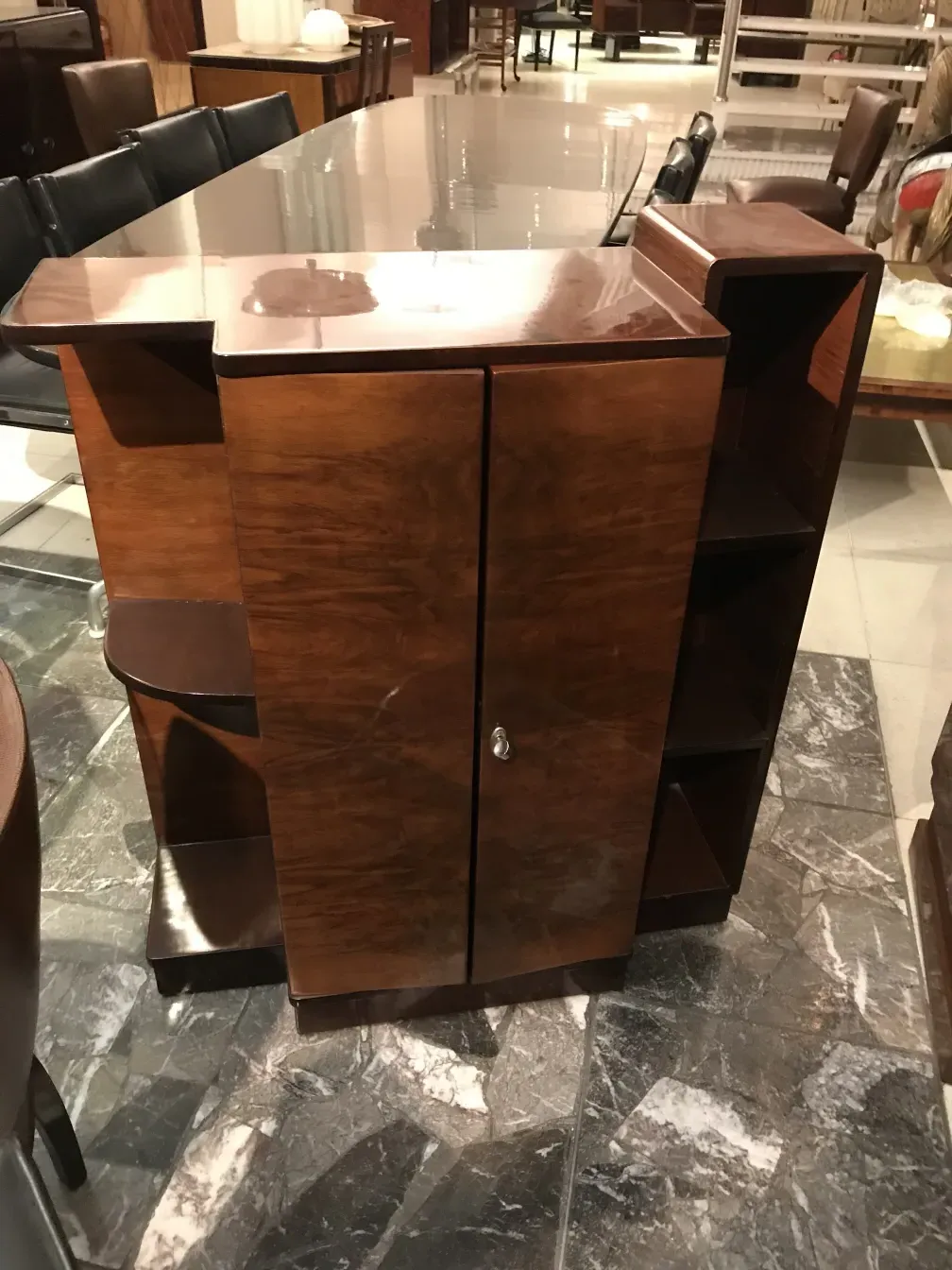 Antique bookcase with practical shelf in an elegant setting