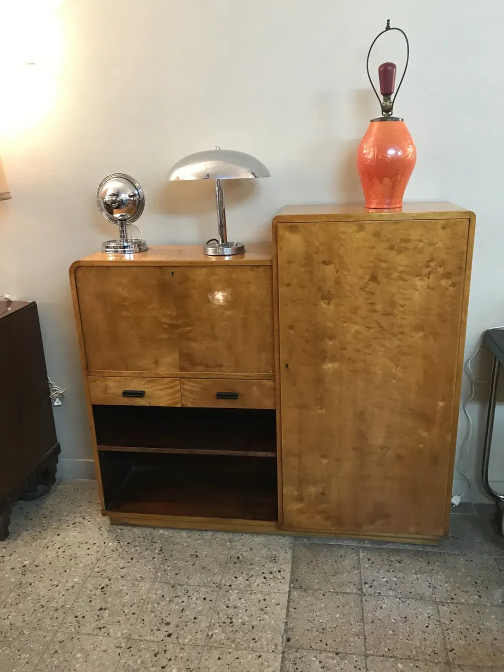 Antique wooden desk with lamp and decoration