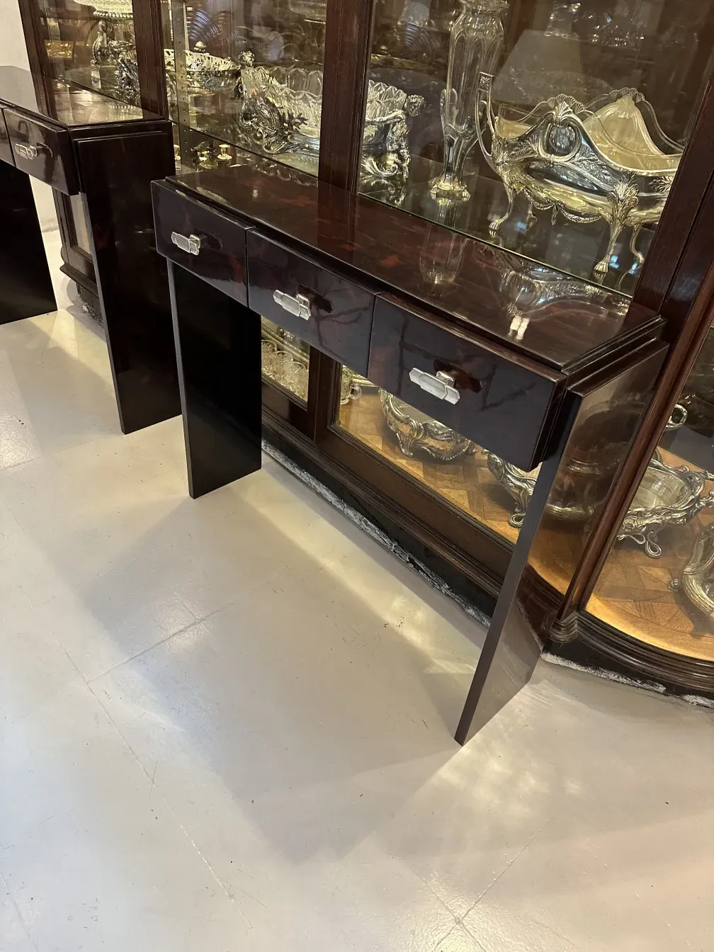 two antique consoles with drawers, decorative background