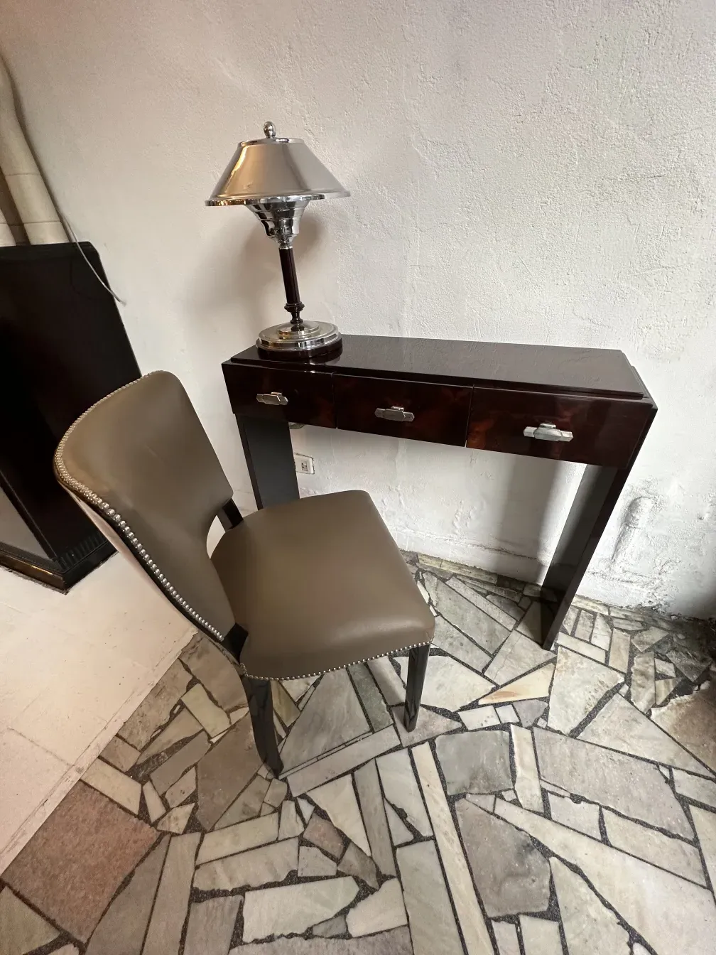 ancient consoles with drawers and decorative lamp