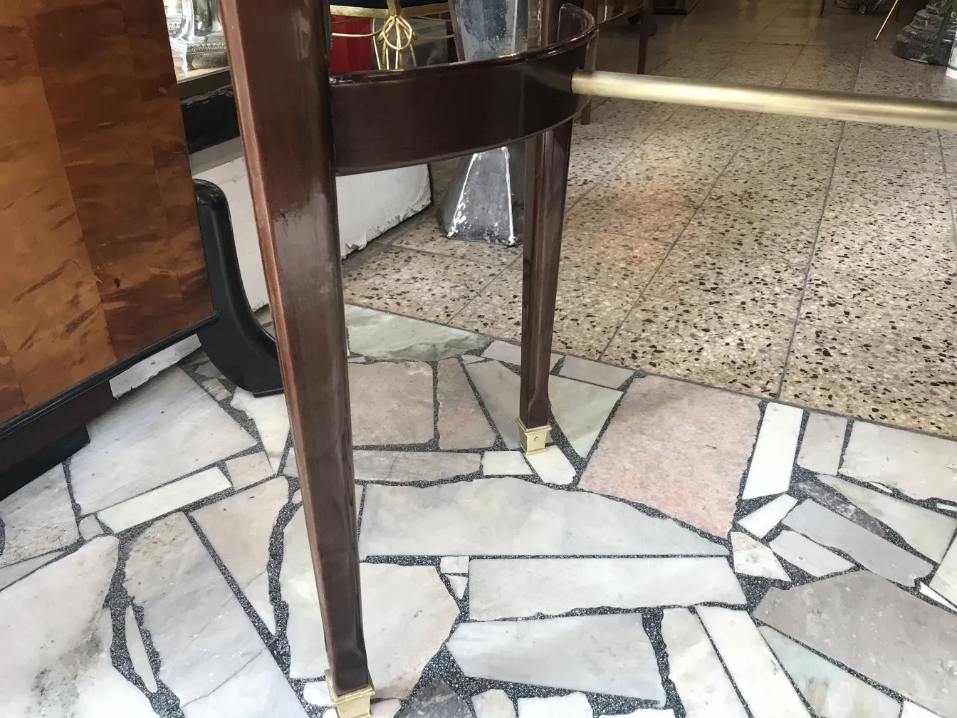 Antique Art Deco dining table for 4 people in an elegant setting.