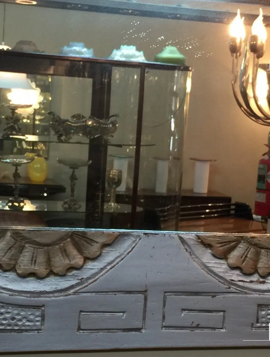 antique mirror with embossed decoration and elegant background