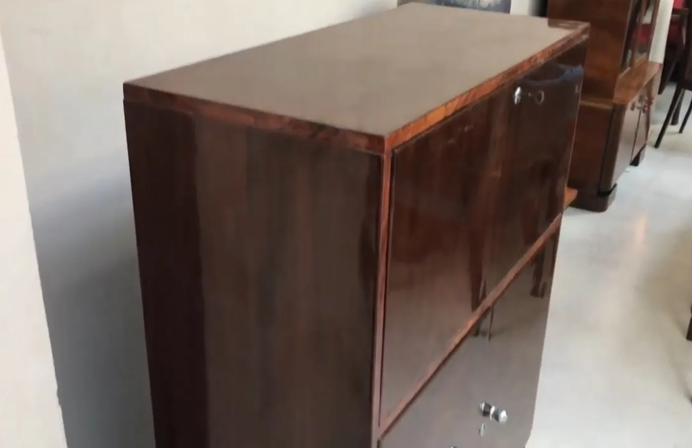 Antique wooden desk with a polished surface and elegant design.